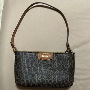 Calvin Klein Black and Brown Shoulder Bag with Monogram Print
